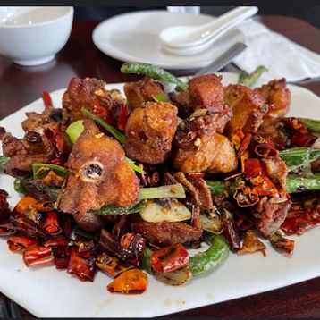 T11.Griddle Cooked Chicken with Dried Chilli Peppers
