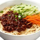 Noodles Topped With Savory Minced Pork, Soybean Paste Sauce, And Cucumber Shreds