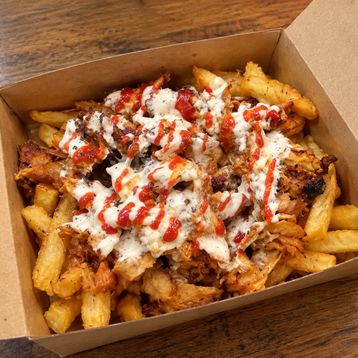 Fries Special - with Meats and Our Homemade Sauces on Top!