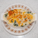 Baked fish fillet & spinach with cream sauce on rice